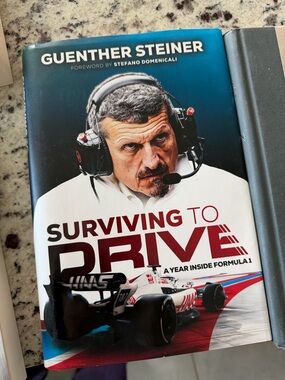 Surviving to Drive by Guenther Steiner - White, Blue, Red Cover